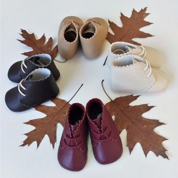 Zapatos de bebé suela blanda en piel tono burdeos